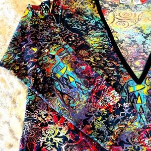 Chico’s Spa Collection Size 2 multi-colored tunic.